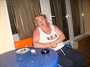 Отдельный вход в номер стол, стул, женщина, дверь